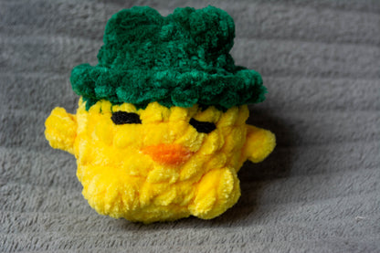 Léon le poussin à chapeau